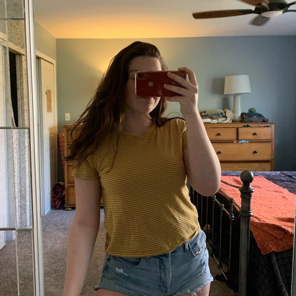 Yellow tee with black and white stripes